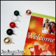 Attractive, easy and affordable, painted ball finials instantly improve year-round banner brackets for the holiday season